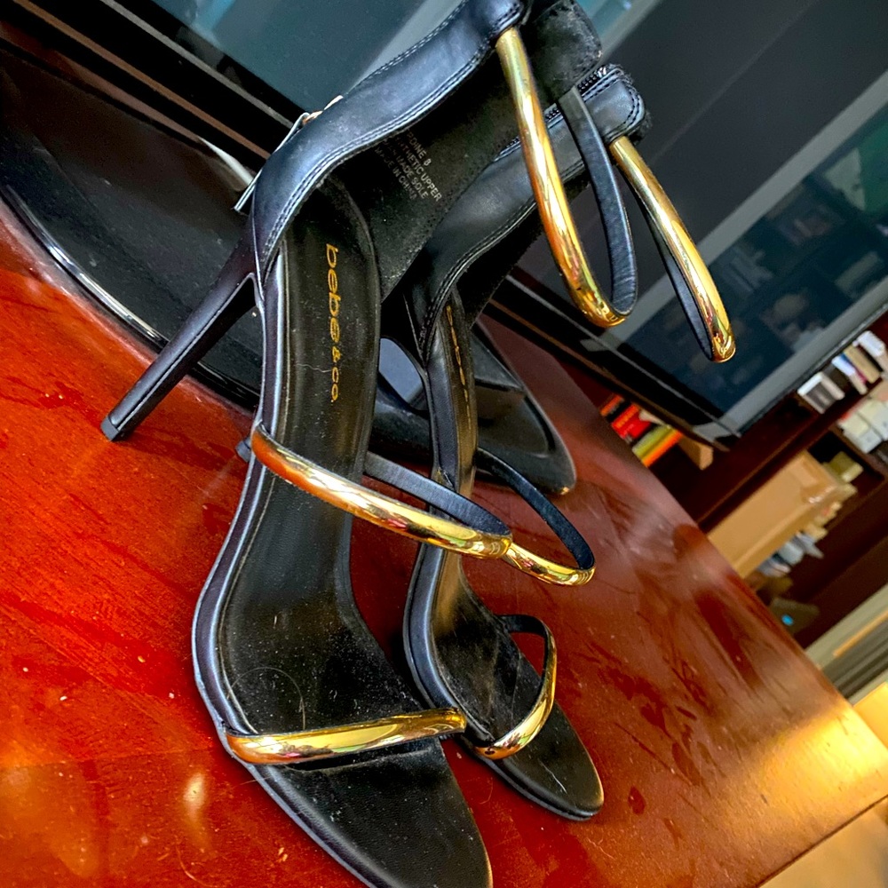 Bebe Black Gladiator Heels with Gold Accents